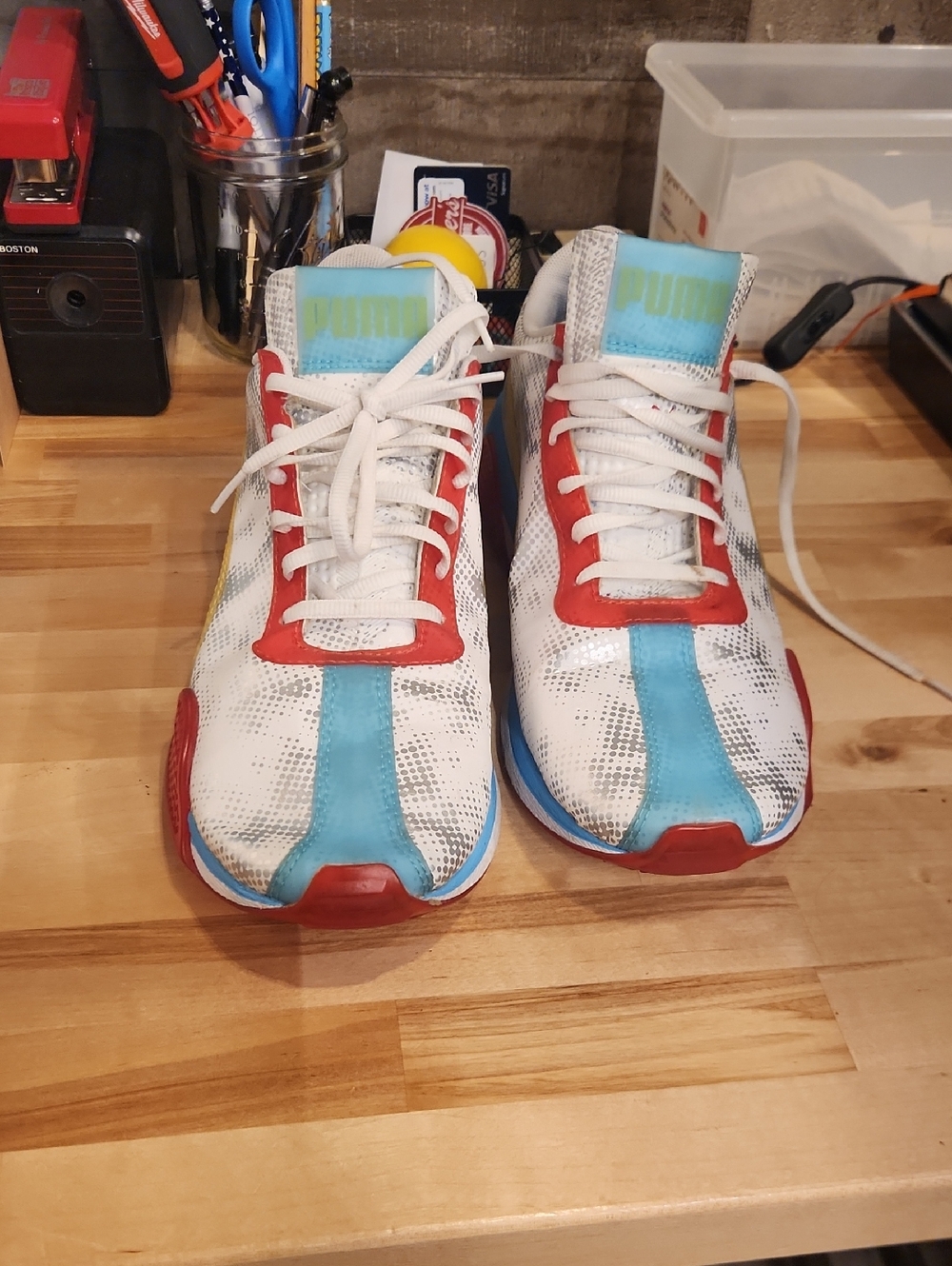 Puma White Sneakers with Blue Stripe and Red Accents